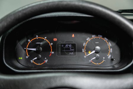 Photo for Car dashboard with red  backlight: Odometer, speedometer, tachometer, fuel level, water temperature and mor - Royalty Free Image