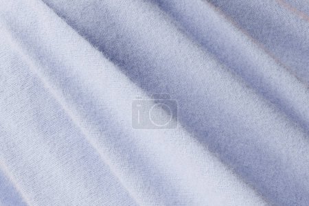 Foto de Toalla mullida azul brillante. La textura de la tela, toalla con piel de cerca. ilustración 3d - Imagen libre de derechos