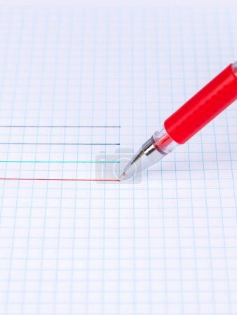 Photo for Close up red pen with stroke on white paper. Pen with drawing line - Royalty Free Image