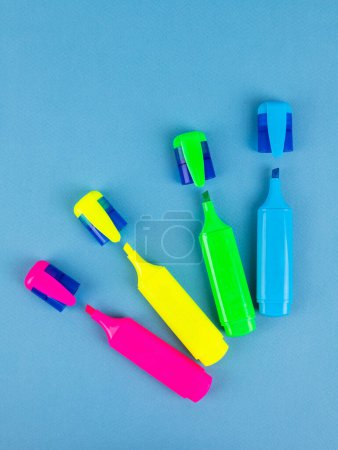 Photo for Magic pen on a blue background. stabilo with four color, fit for mockup design - Royalty Free Image