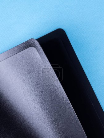 Photo for Close-up view of black  plastic document folder on office table - Royalty Free Image