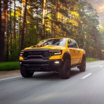  Novosibirsk, Russia - July 27, 2023:  yellow Dodge Ram Trx Havok Edition, pickup  driving  in  park, front view