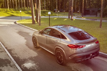 Photo for Novosibirsk, Russia - July  21, 2023:  silver Mercedes-Benz GLE Coupe AMG 53 4Matic+ 2023,   back  view.   Luxury  sedan made in Germany - Royalty Free Image