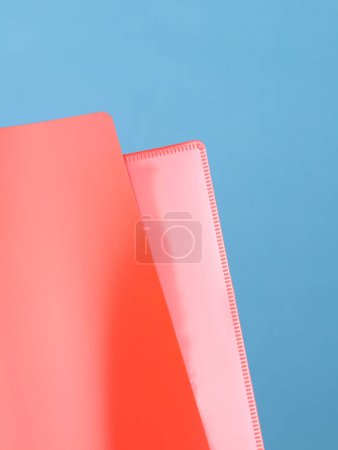 Photo for A red  plastic folder for storing office work documents, close up - Royalty Free Image