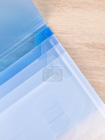 Photo for Close-up view of blue  plastic document folder on office table - Royalty Free Image