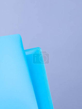 Photo for A blue  plastic folder for storing office work documents, close up - Royalty Free Image