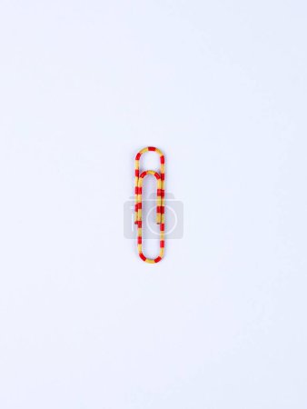 Photo for Colorful paper clips on white   paper. ready for your design - Royalty Free Image