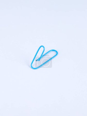 Photo for Blue  paperclip isolated on white background. - Royalty Free Image