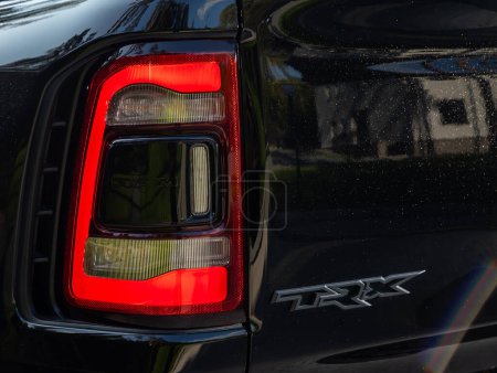 Photo for Novosibirsk, Russia - September 11  , 2023:  Dodge Ram Trx,  glowing tailight of a modern  black pickup close-up. Exterior detail . - Royalty Free Image