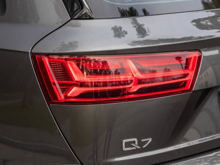 Photo for Novosibirsk, Russia -  October 11  , 2023:  Audi Q7, Close up detail on one of the LED taillights modern car. - Royalty Free Image