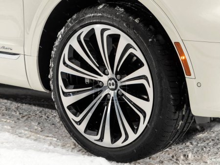 Photo for Novosibirsk, Russia -  November 03  , 2023: Bentley Bentayga ,    Car wheel with alloy wheel and new rubber on a car closeup. Wheel tuning dis - Royalty Free Image