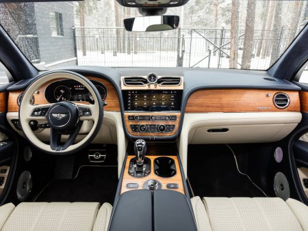 Photo for Novosibirsk, Russia -  November 03  , 2023: Bentley Bentayga ,   steering wheel, shift lever and dashboard, climate control, speedometer, display - Royalty Free Image