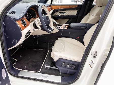 Photo for Novosibirsk, Russia -  November 03  , 2023: Bentley Bentayga ,   interior details, driver's seat. Beige leather interior. - Royalty Free Image