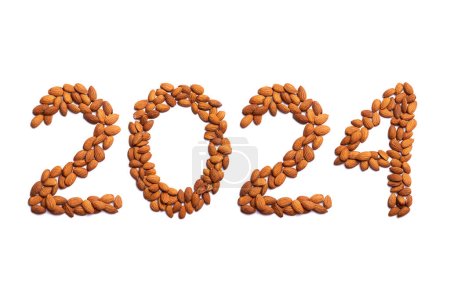 Téléchargez les photos : En-tête du calendrier numéro 2024 en amandes sur fond blanc. Bonne année 2024 fond coloré. - en image libre de droit