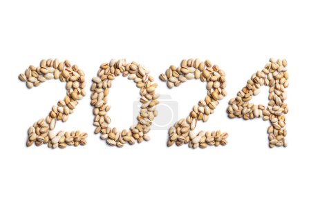 Foto de Cabecera del calendario número 2024 hecha de pistachos sobre un fondo blanco. Feliz Año Nuevo 2024 fondo colorido. - Imagen libre de derechos
