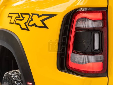 Photo for Novosibirsk, Russia -  November 20  , 2023:       Dodge Ram Trx HAVOC EDITION, Close up detail on one of the LED  taillight modern pickup. Exterior detail automobile. - Royalty Free Image