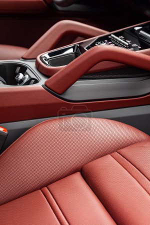 Photo for Part of  red leather car seat details. lose-up perforated leather car seat. Skin texture - Royalty Free Image