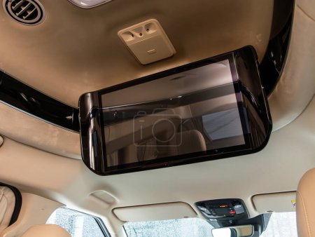 Photo for Novosibirsk, Russia -  December 21 , 2023:  KIA Carnival, monitor for watching tv back seat - Royalty Free Image