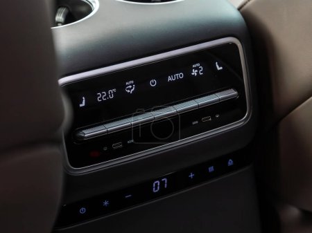 Photo for Novosibirsk, Russia -  December 28  , 2023:   LI L9, control panel for the convenience of rear seat passengers: climate control, seat heating, cup holders - Royalty Free Image