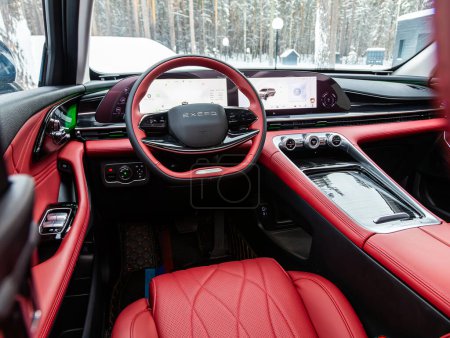 Photo for Novosibirsk, Russia - January  05 , 2024: black EXEED  RX, car Interior - steering wheel, shift lever and dashboard, climate control, speedometer, display  in luxury ca - Royalty Free Image
