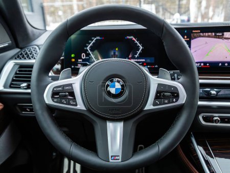 Photo for Novosibirsk, Russia - January  05 , 2024: black  BMW X7 ,  cockpit interior cabin details, speedometer and tachometer. Black leather interior - Royalty Free Image