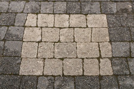 Photo for The wall is paved with gray stones, top view. stone texture, outdoor stone tiles - Royalty Free Image