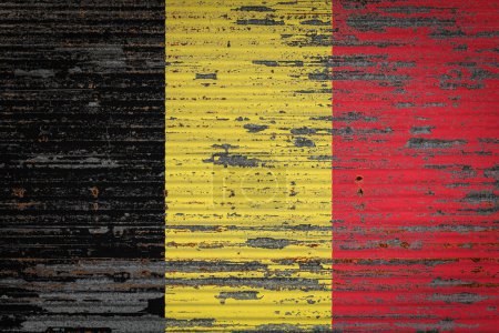 Photo for Close-up of old metal wall with national flag of Belgium . Concept of  Belgium  export-import, storage of goods and national delivery of goods. Flag in grunge style - Royalty Free Image