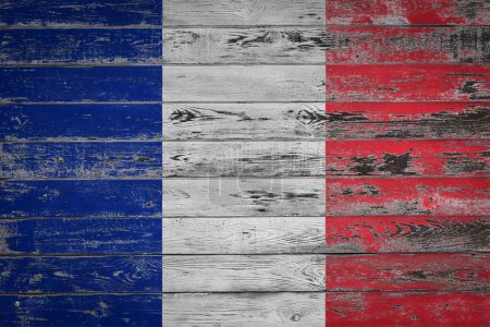 Foto de La bandera nacional de Francia está pintada sobre tablas de madera desiguales. Símbolo país. - Imagen libre de derechos