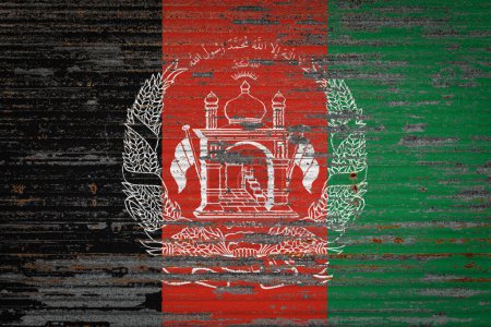 Photo for Close-up of old metal wall with national flag of Afghanistan. Concept of Afghanistan export-import, storage of goods and national delivery of goods. Flag in grunge style - Royalty Free Image