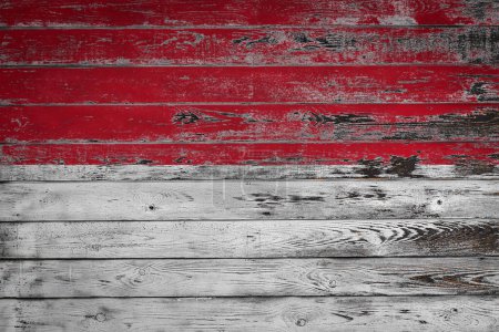 Téléchargez les photos : Le drapeau national de Monaco est peint sur des planches de bois inégales. Pays symbole. - en image libre de droit