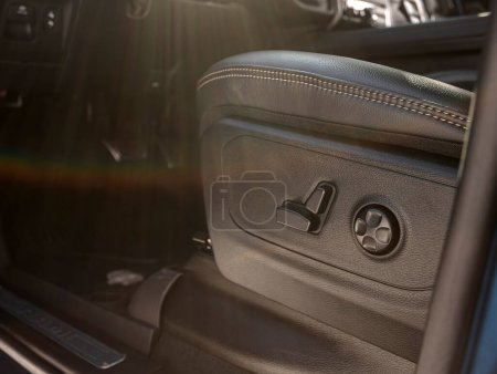 Téléchargez les photos : Novossibirsk, Russie - mars 22, 2024 : Dodge Ram Trx, close-up of seat setting buttons on car panel, no trade marks - en image libre de droit