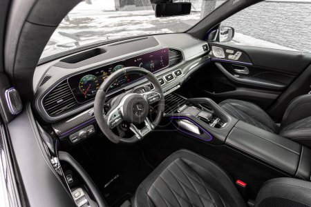 Photo for Novosibirsk, Russia - July  21, 2023: Mercedes-Benz GLE  , Interior of new modern SUV car with steering wheel, shift lever and dashboard, climate control, speedometer, display.  Red leather interior - Royalty Free Image