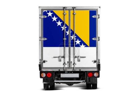 A truck with the national flag of Bosnia Herzegovina  depicted on the tailgate drives against a white background. Concept of export-import, transportation, national delivery of goods