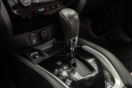 Novosibirsk, Russia -  April 04 , 2024:  Nissan Qashqai,  Close up of the manual gearbox transmission handle. Accelerator handle and buttons in a new car.