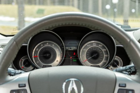 Photo for Novosibirsk, Russia - April  01, 2024:  gray  Acura MDX, dashboard of the car is illuminated by bright illumination,  speedometer, tachometer, fuel level, water temperature and mor - Royalty Free Image