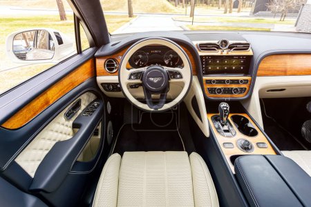 Photo for Novosibirsk, Russia -  May 01  , 2024:  white Bentley Bentayga  ,   interior details, driver's seat. Beige leather interior. - Royalty Free Image