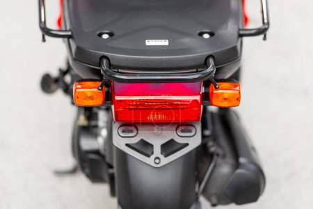 Photo for Novosibirsk, Russia -  May 01  , 2024:   red  moped Yamaha Gear , Close up detail on one of the LED  red taillight - Royalty Free Image