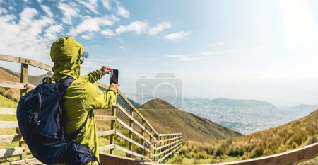 Photo for Man taking photo from the mountain. High quality photo - Royalty Free Image