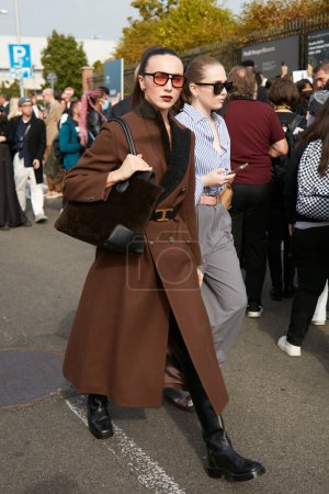 Photo for MILAN, ITALY - SEPTEMBER 23, 2022: Mary Leest with brown coat before Tods fashion show, Milan Fashion Week street style - Royalty Free Image