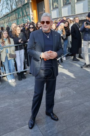 Photo for MILAN, ITALY - JANUARY 14, 2023: Roberto Baggio before Emporio Armani fashion show, Milan Fashion Week street style - Royalty Free Image