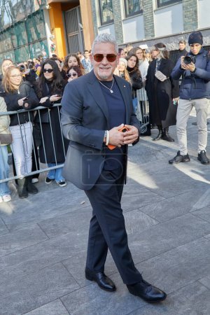 Téléchargez les photos : MILAN, ITALY - JANUARY 14, 2023: Roberto Baggio before Emporio Armani fashion show, Milan Fashion Week street style - en image libre de droit