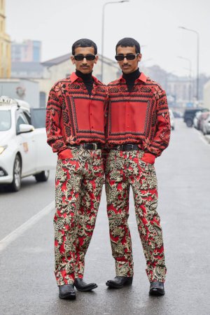 Foto de MILAN, ITALY - JANUARY 15, 2023: Mohammed Hadban and Humaid Hadban before Etro fashion show, Milan Fashion Week street style - Imagen libre de derechos
