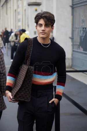 Foto de MILAN, ITALY - JANUARY 15, 2023:  Nic Kaufmann before Prada fashion show, Milan Fashion Week street style - Imagen libre de derechos