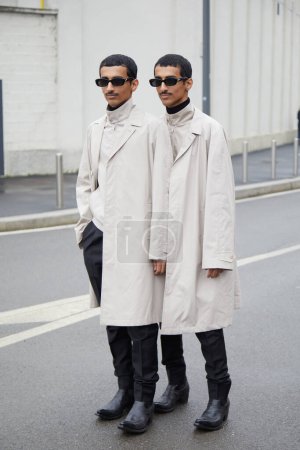 Téléchargez les photos : MILAN, ITALY - JANUARY 15, 2023: Mohammed Hadban and Humaid Hadban before Prada fashion show, Milan Fashion Week street style - en image libre de droit