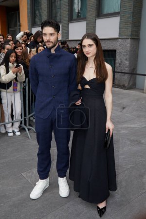 Photo for MILAN, ITALY - FEBRUARY 23, 2023: Raffey Cassidy and guest before Emporio Armani fashion show, Milan Fashion Week street style - Royalty Free Image