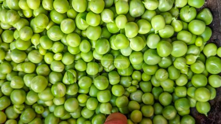 Fresh green peas in the bowl