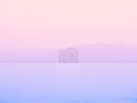 Téléchargez les photos : Belle plage ciel doux couleurs pastel coucher de soleil aube boulangerie - en image libre de droit