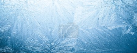 Foto de Patrones de heladas de invierno en vidrio. Cristales de hielo o fondo frío de invierno. - Imagen libre de derechos