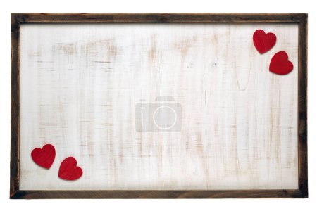 Téléchargez les photos : Red Valentine's Day hearts on wooden frame background - en image libre de droit