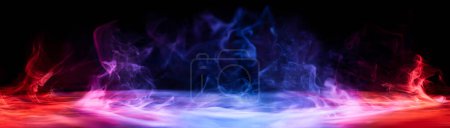 Photo for Dramatic smoke and fog in contrasting vivid red, blue, and purple colors. Vivid and intense abstract background or wallpaper. - Royalty Free Image